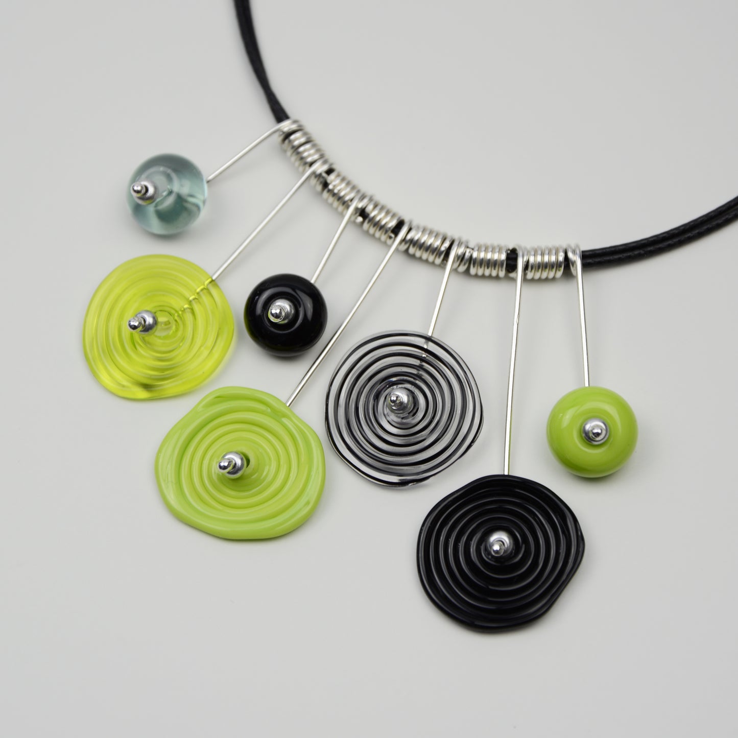 Spiral drop necklace in lime green & black, 7 bead