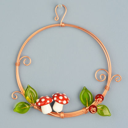Miniature copper wreath with glass mushrooms, berries and leaves
