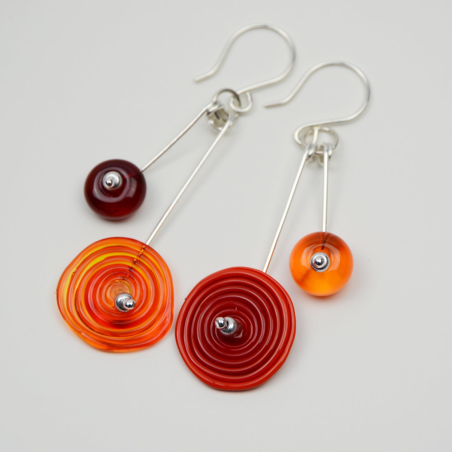Spiral drop earrings in red & orange