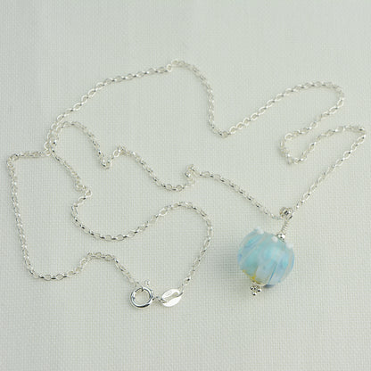 Pale blue and white glass beads imploded flower pendant on silver chain