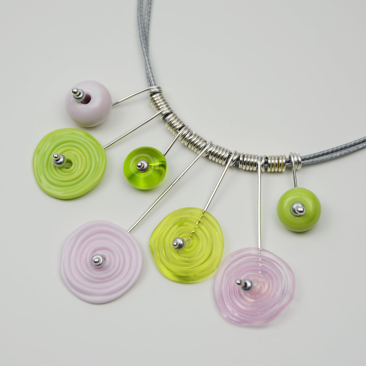 Spiral drop necklace in pink & lime green, 7 bead